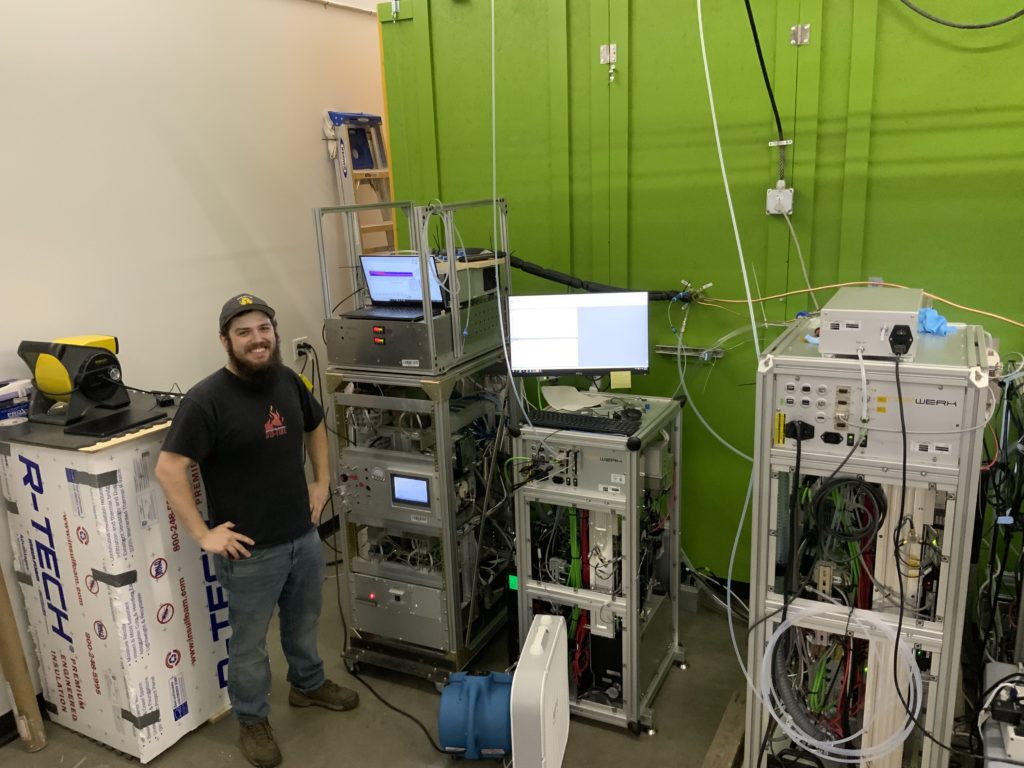 Damien Ketcherside stands in a lab in the Powerhouse