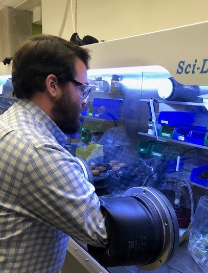 Spencer uses equipment in a lab in the Powerhouse