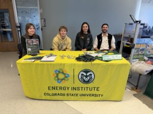 4 outreach team members at a table